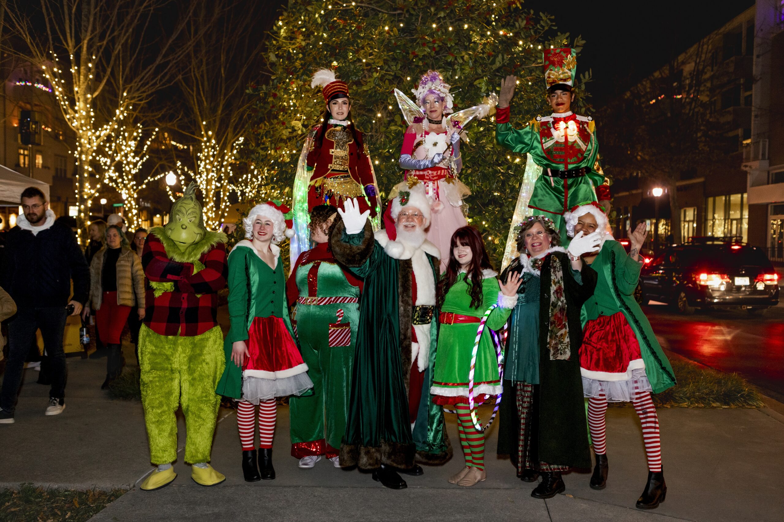 Santa, elves, and the grinch gathered around Biltmore Park's Christmas tree - part of the annual Santa in the Square holiday event in Asheville!